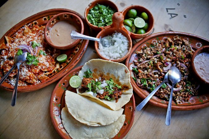 Dishes from La Cocina de Doña Esthela. Credit Sandy Huffaker for The New York Times